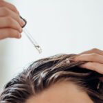 Scalp massage with rosemary oil