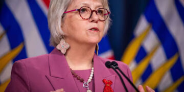 Passengers aren't showing any symptoms, Dr Bonnie Henry says
