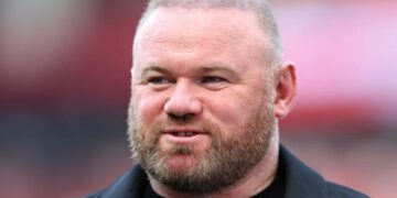 Rooney names team to win title
